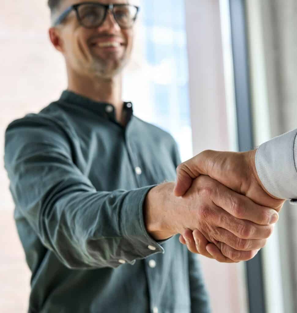 client and attorney are shaking hands